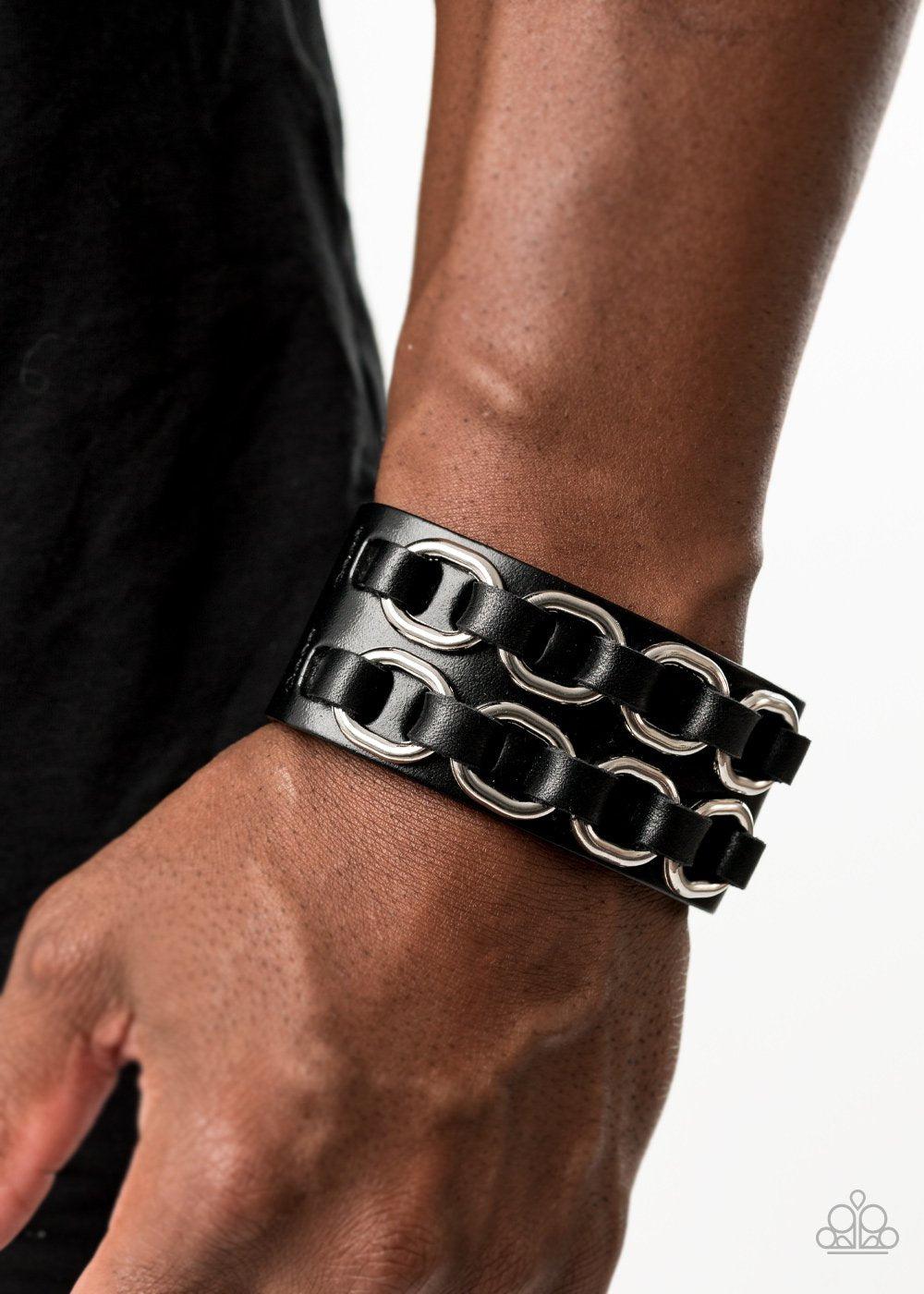 Throttle It Out Men's Black Urban Bracelet - Paparazzi Accessories- on model - CarasShop.com - Paparazzi Jewelry by Cara Jewels