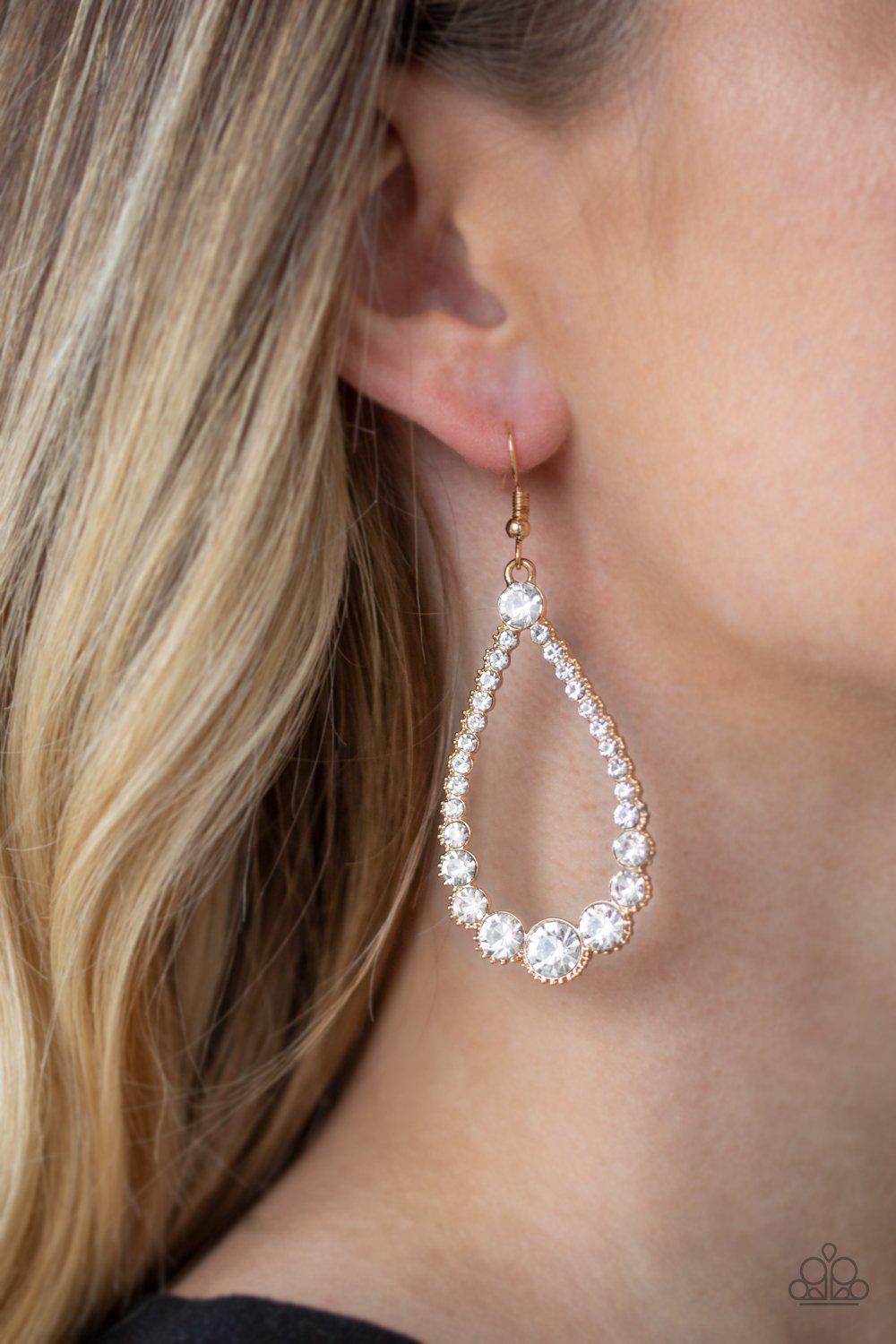 Token Twinkle Gold and White Rhinestone Teardrop Earrings - Paparazzi Accessories- lightbox - CarasShop.com - Paparazzi Jewelry by Cara Jewels