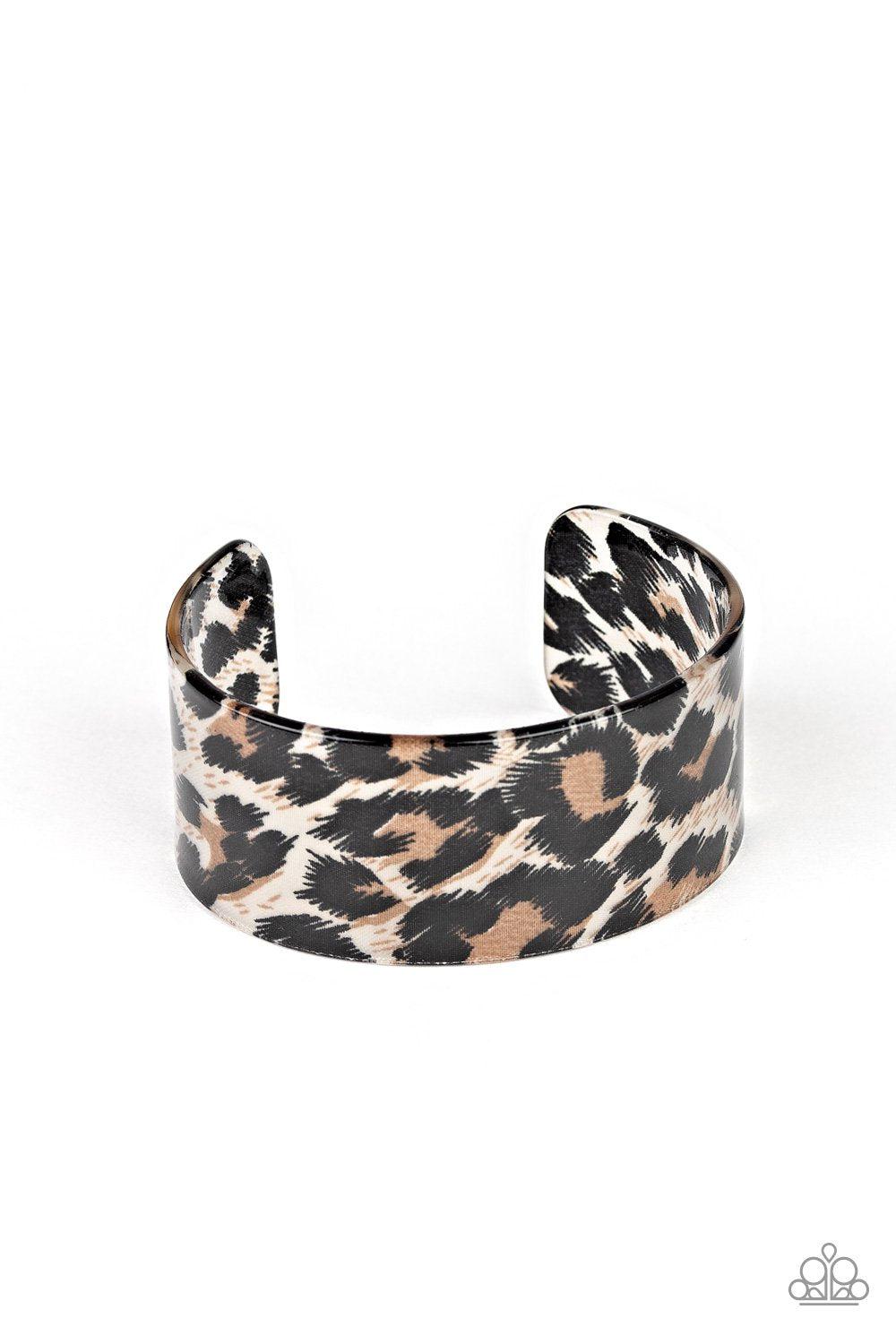 Top Cat Brown Animal Print Acrylic Cuff Bracelet - Paparazzi Accessories- on model - CarasShop.com - Paparazzi Jewelry by Cara Jewels
