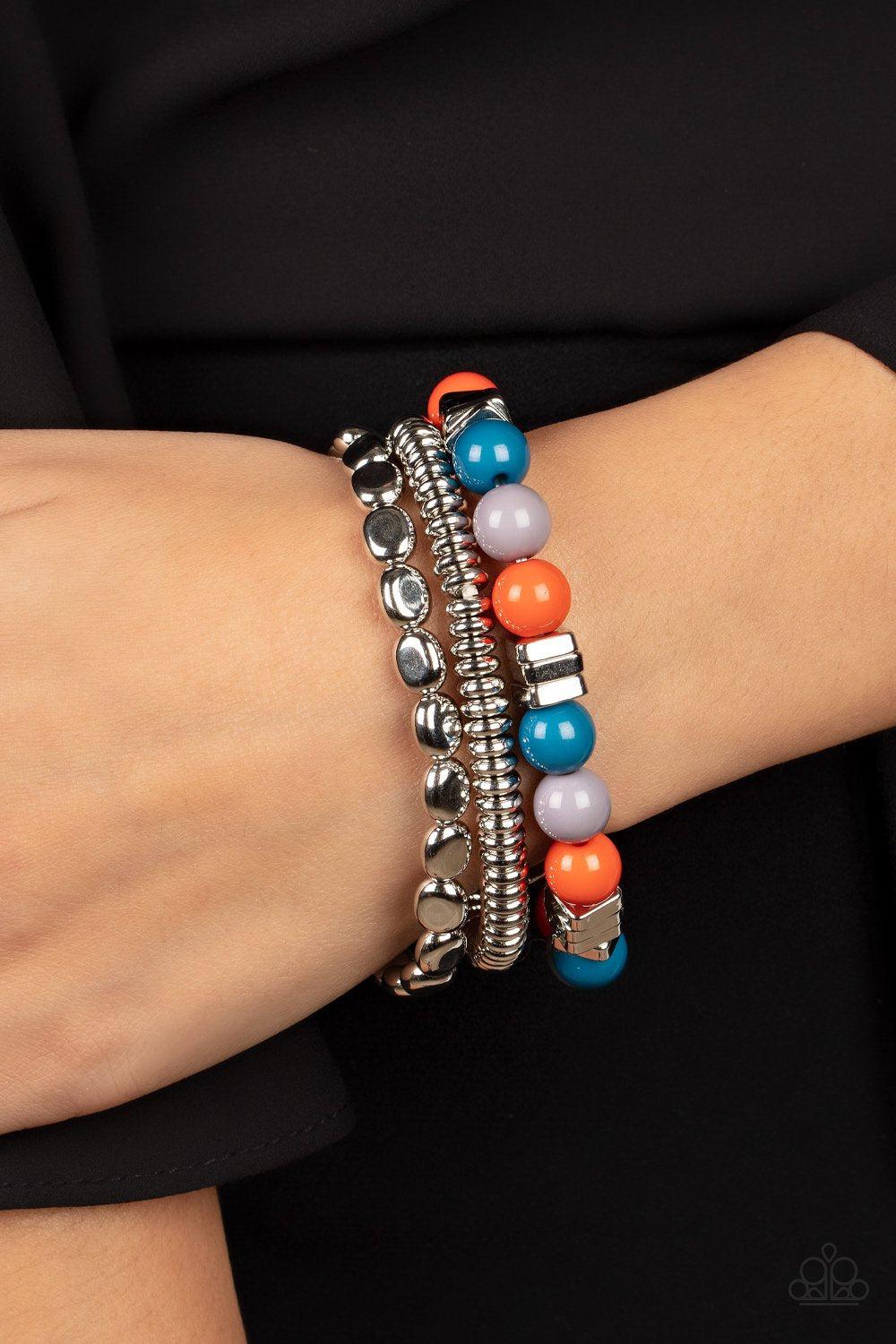 Tour de Tourist Multi Blue, Orange and Silver Bracelet Set - Paparazzi Accessories- on model - CarasShop.com - Paparazzi Jewelry by Cara Jewels