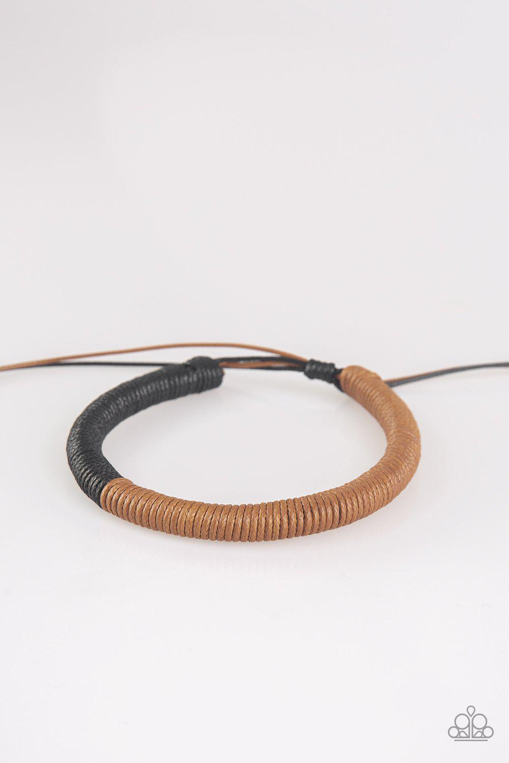 TRACKER and Field Black and Brown Leather Urban Knot Bracelet - Paparazzi Accessories- on model - CarasShop.com - Paparazzi Jewelry by Cara Jewels