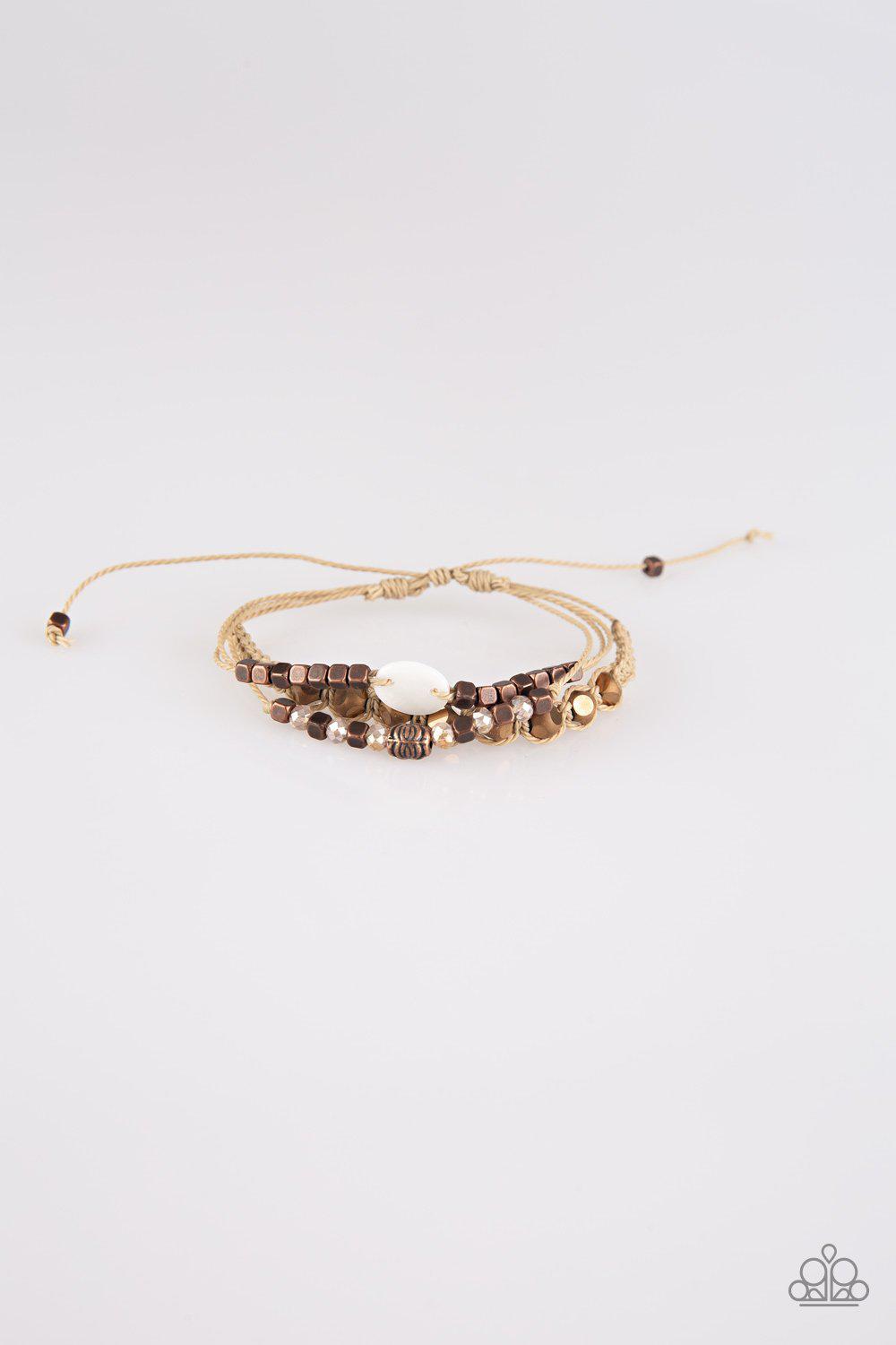 Trendy Tourist Copper Urban Sliding knot Bracelet - Paparazzi Accessories- on model - CarasShop.com - Paparazzi Jewelry by Cara Jewels