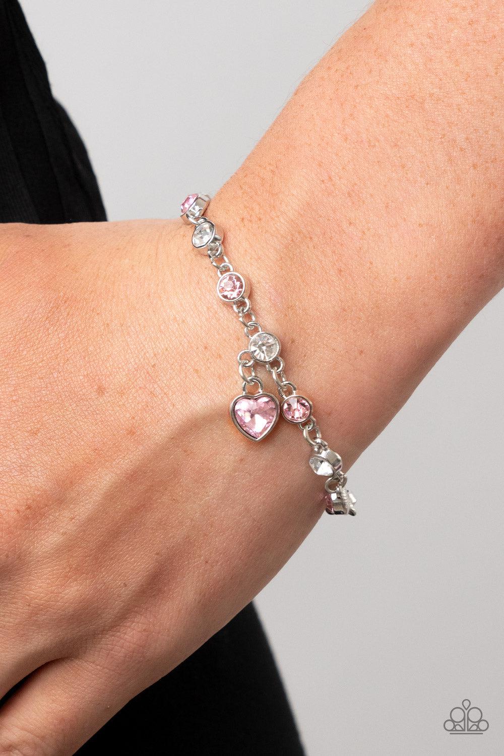 Truly Lovely Pink Rhinestone Heart Bracelet - Paparazzi Accessories- on model - CarasShop.com - Paparazzi Jewelry by Cara Jewels