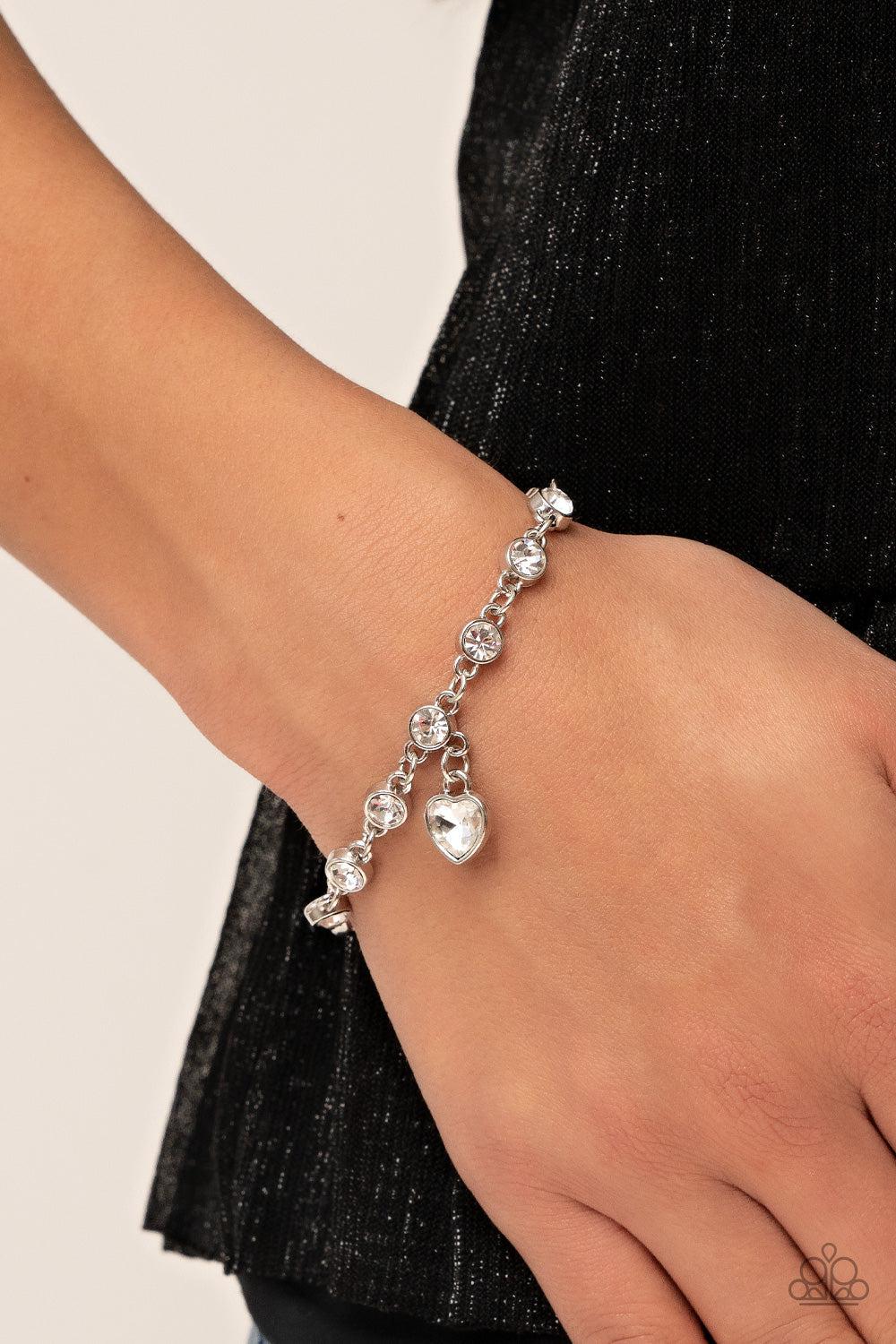 Truly Lovely White Rhinestone Heart Charm Bracelet - Paparazzi Accessories- on model - CarasShop.com - Paparazzi Jewelry by Cara Jewels