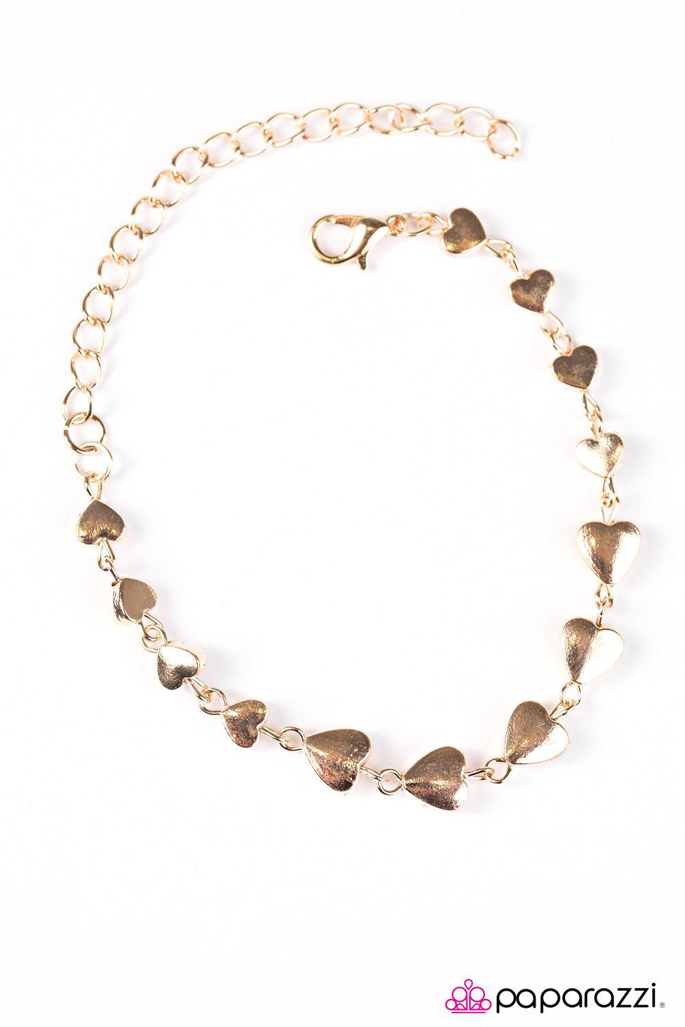 Turn up the Heartbeat Gold Bracelet - Paparazzi Accessories- on model - CarasShop.com - Paparazzi Jewelry by Cara Jewels