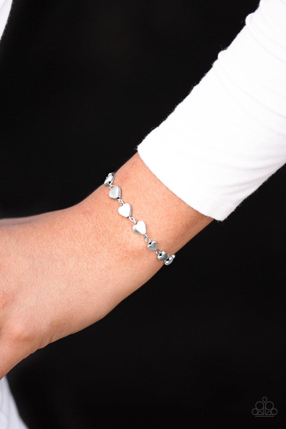 Turn up the Heartbeat Silver Bracelet - Paparazzi Accessories- lightbox - CarasShop.com - Paparazzi Jewelry by Cara Jewels
