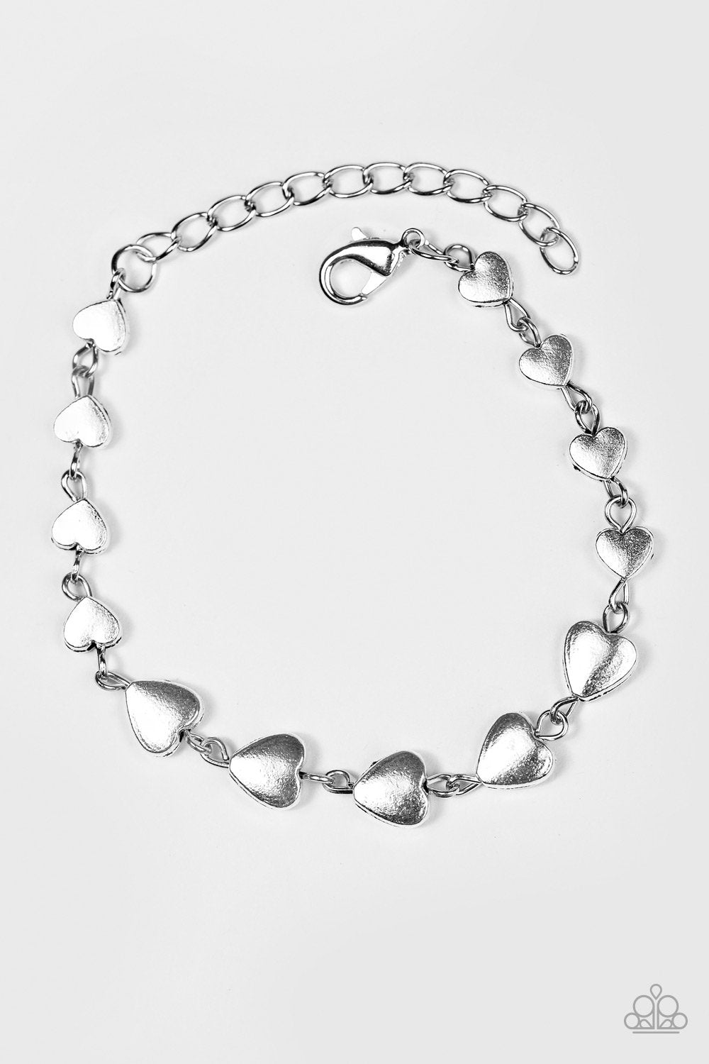 Turn up the Heartbeat Silver Bracelet - Paparazzi Accessories- on model - CarasShop.com - Paparazzi Jewelry by Cara Jewels