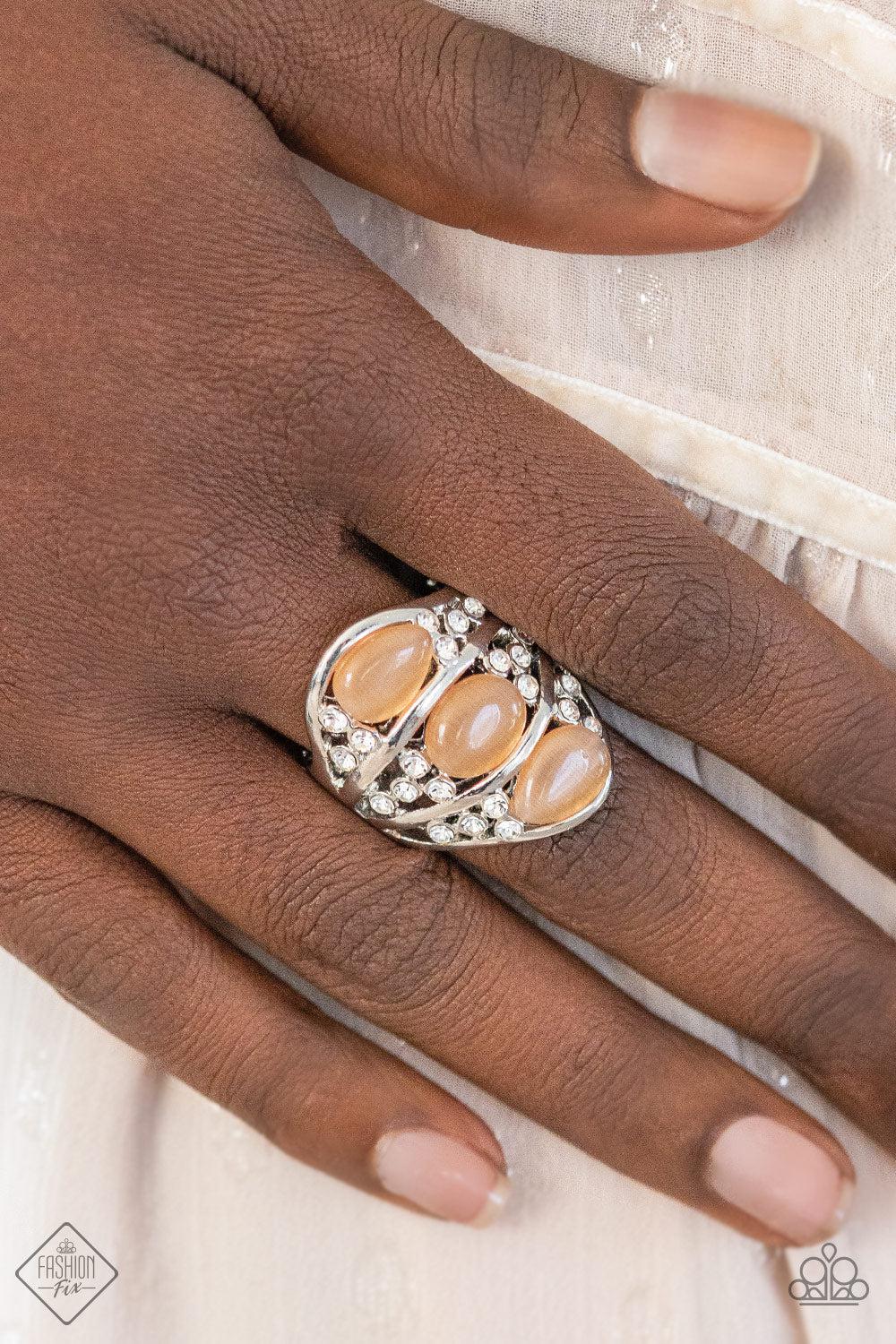 Underrated Shimmer Orange Cat's Eye Ring - Paparazzi Accessories- on model - CarasShop.com - Paparazzi Jewelry by Cara Jewels