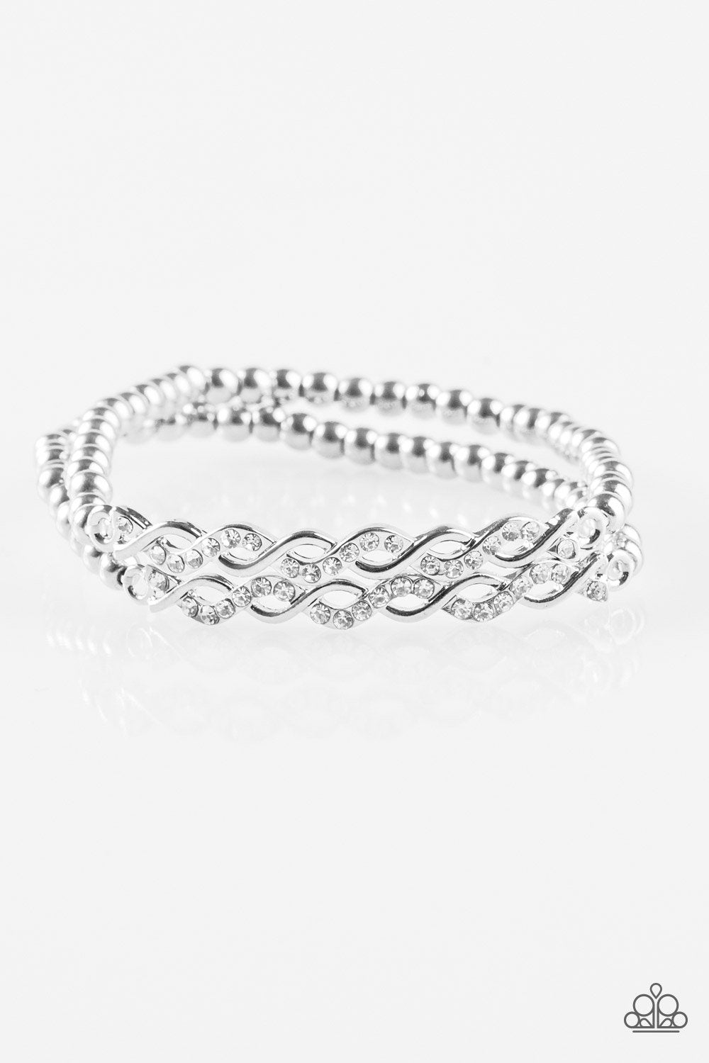 Uptown Utopia Silver and White Bracelet Set - Paparazzi Accessories- on model - CarasShop.com - Paparazzi Jewelry by Cara Jewels