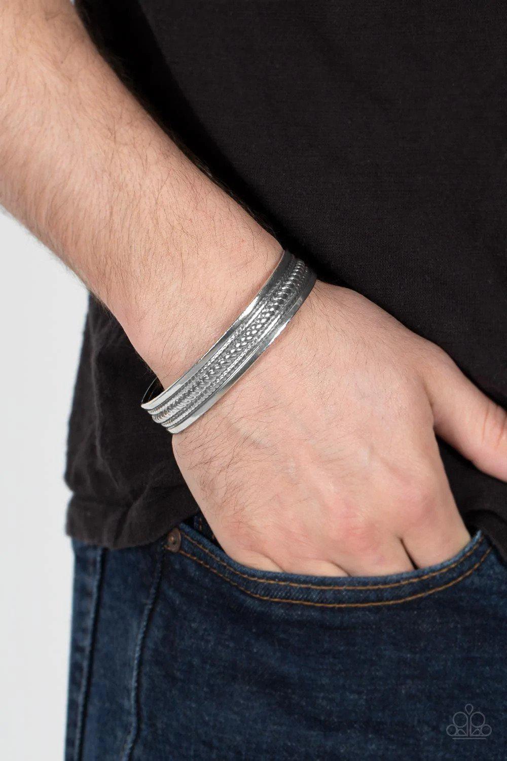 Urban Expedition Men's Silver Cuff Bracelet - Paparazzi Accessories- on model - CarasShop.com - Paparazzi Jewelry by Cara Jewels