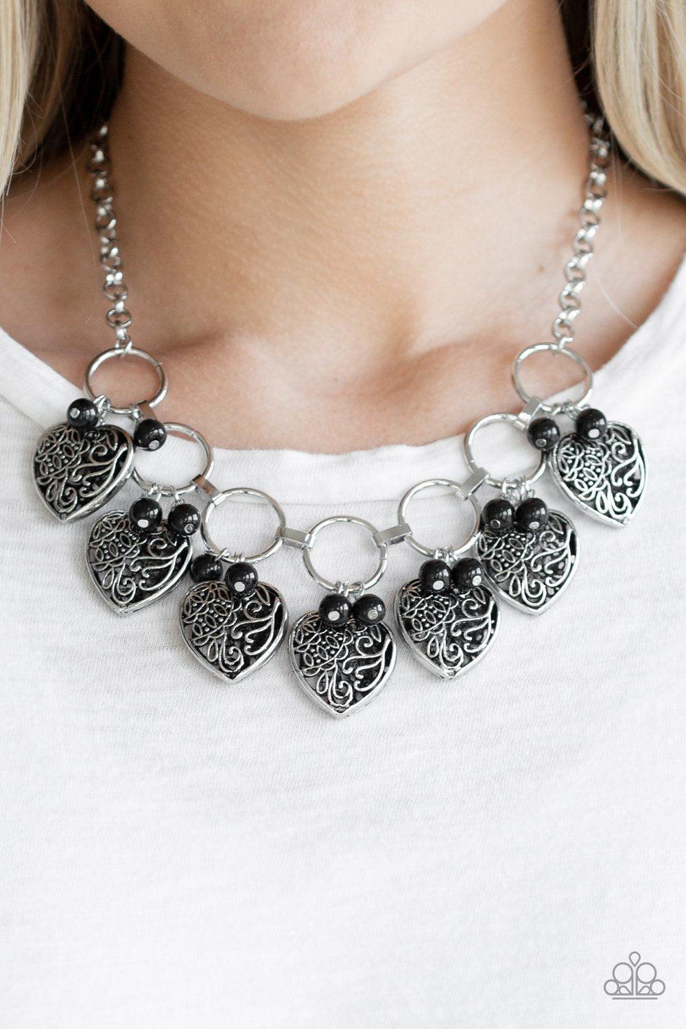 Very Valentine Black and Silver Heart Necklace - Paparazzi Accessories- on model - CarasShop.com - Paparazzi Jewelry by Cara Jewels