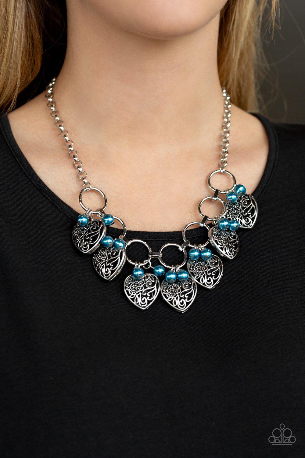 Very Valentine Blue and Silver Heart Necklace - Paparazzi Accessories- on model - CarasShop.com - Paparazzi Jewelry by Cara Jewels