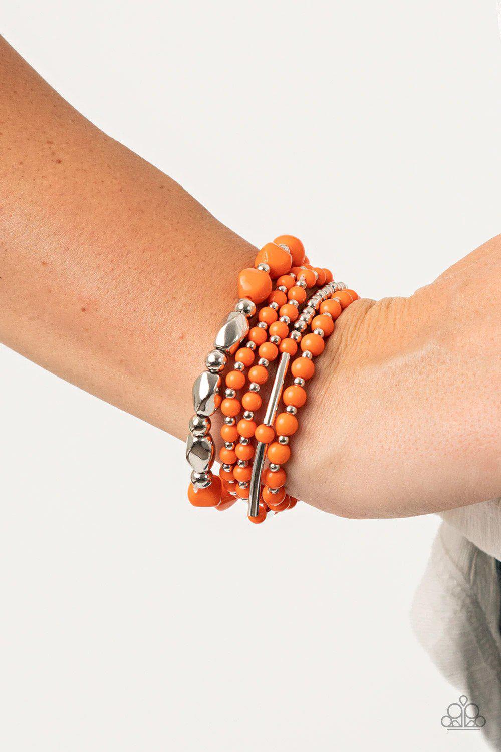 Vibrantly Vintage Orange Bracelet - Paparazzi Accessories- on model - CarasShop.com - Paparazzi Jewelry by Cara Jewels