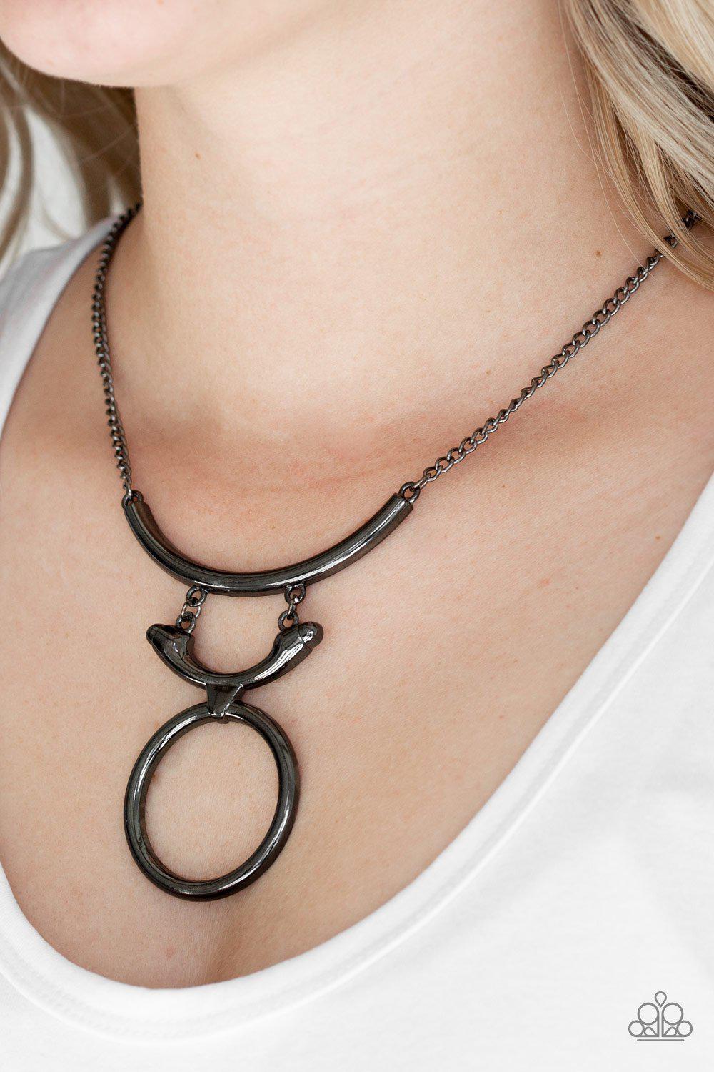 Walk Like An Egyptian Gunmetal Black Necklace - Paparazzi Accessories- on model - CarasShop.com - Paparazzi Jewelry by Cara Jewels