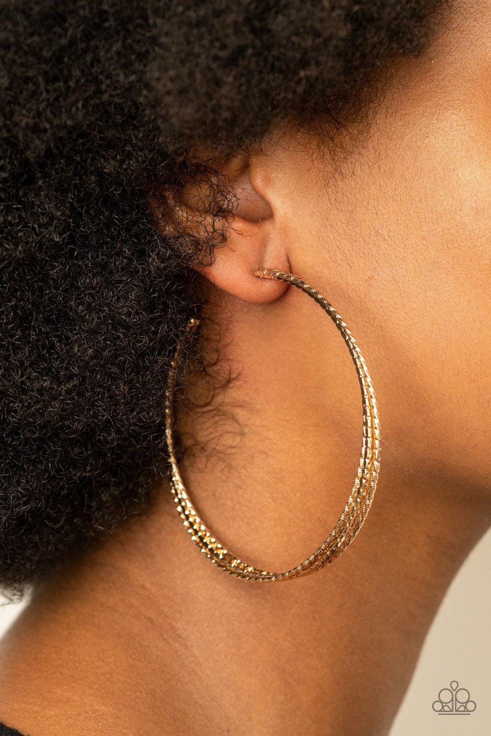 Watch and Learn Gold Hoop Earrings - Paparazzi Accessories- lightbox - CarasShop.com - Paparazzi Jewelry by Cara Jewels