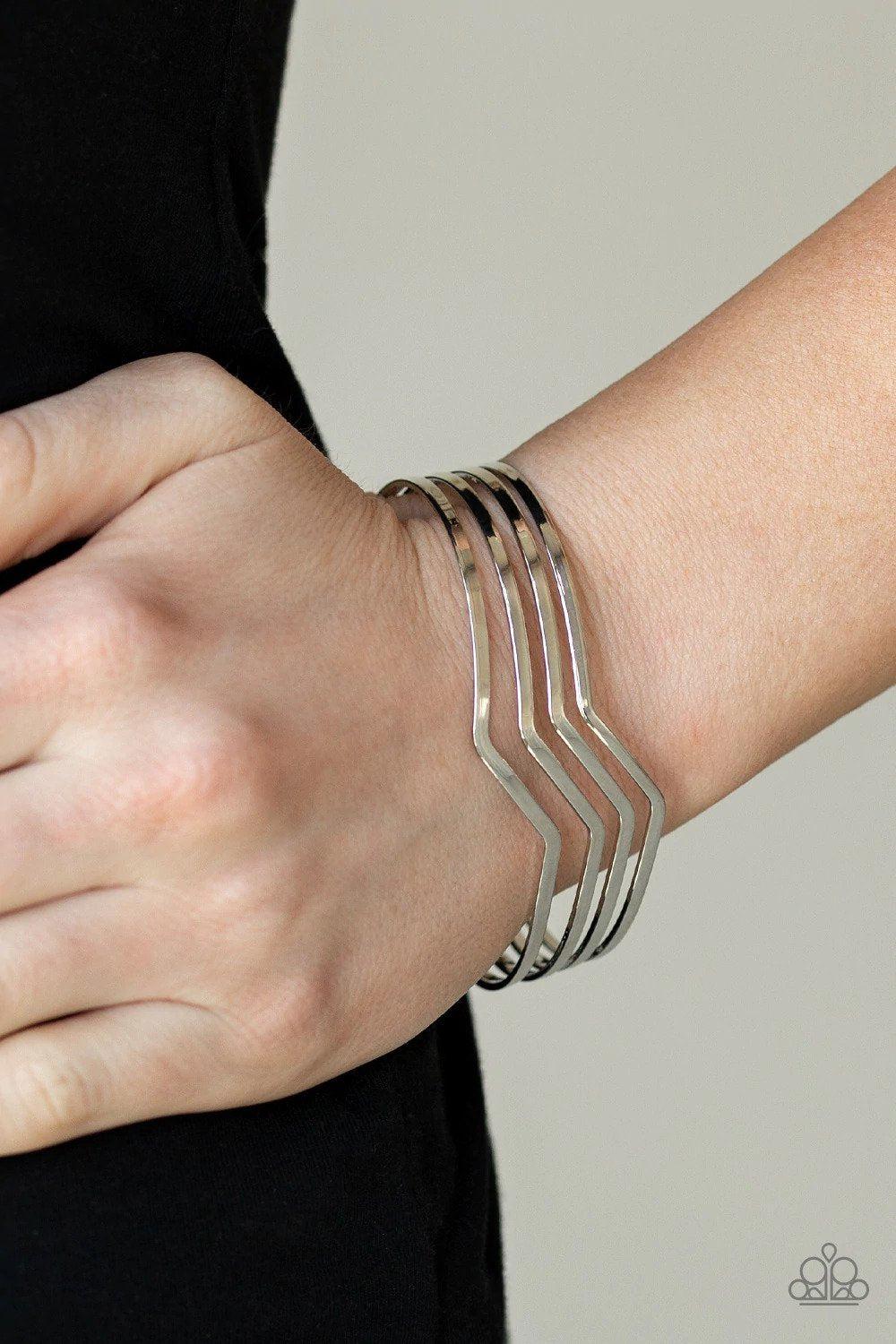 Waverunner Silver Cuff Bracelet - Paparazzi Accessories- on model - CarasShop.com - Paparazzi Jewelry by Cara Jewels