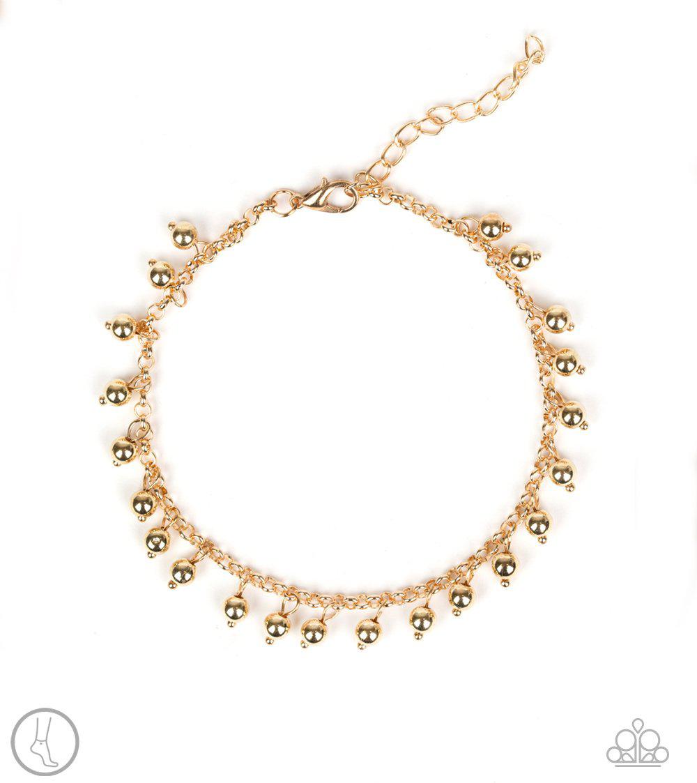 West Coast Cruzin' Gold Anklet - Paparazzi Accessories- on model - CarasShop.com - Paparazzi Jewelry by Cara Jewels