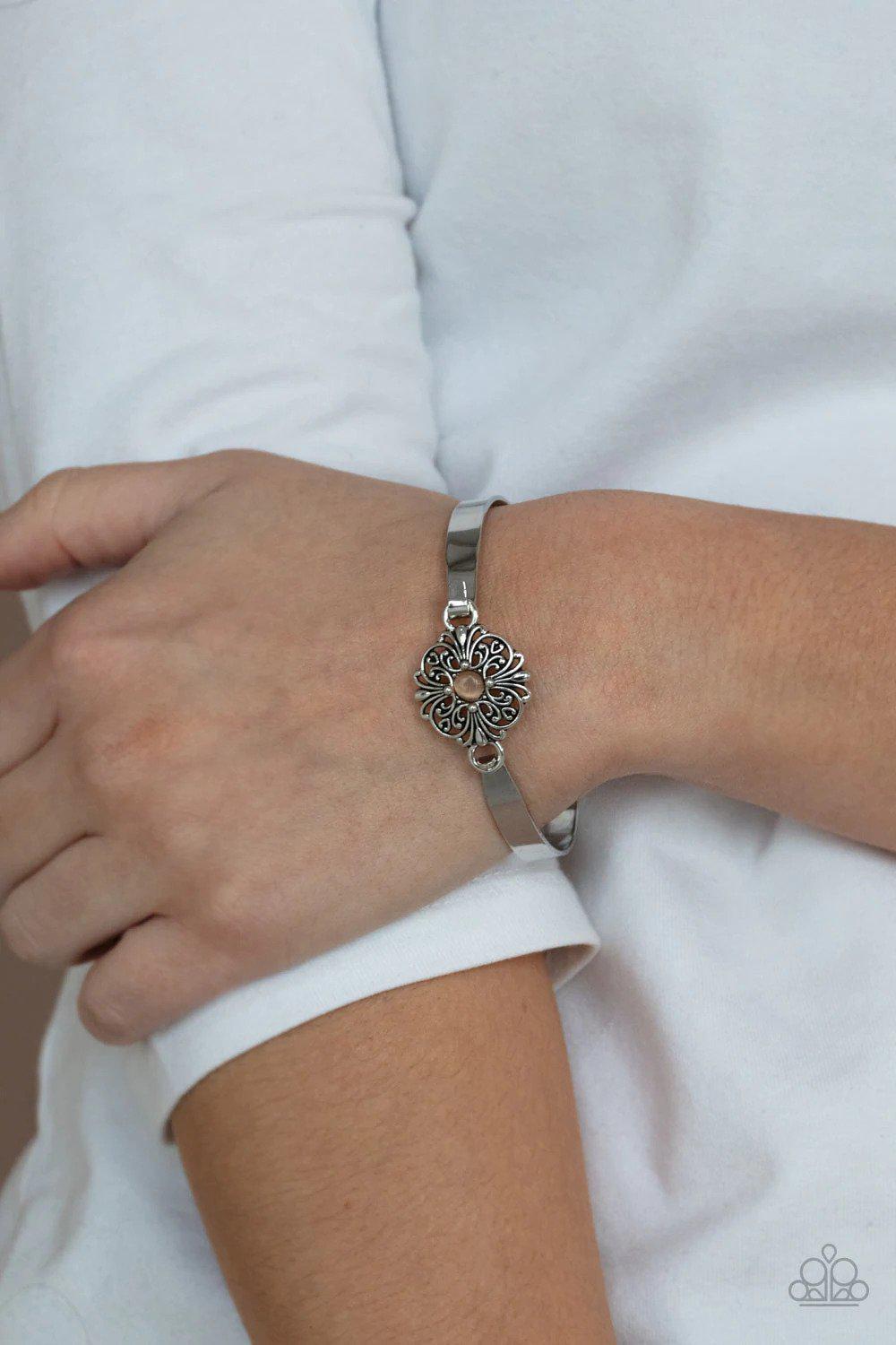Whimsically Welcoming Orange Bracelet - Paparazzi Accessories- on model - CarasShop.com - Paparazzi Jewelry by Cara Jewels