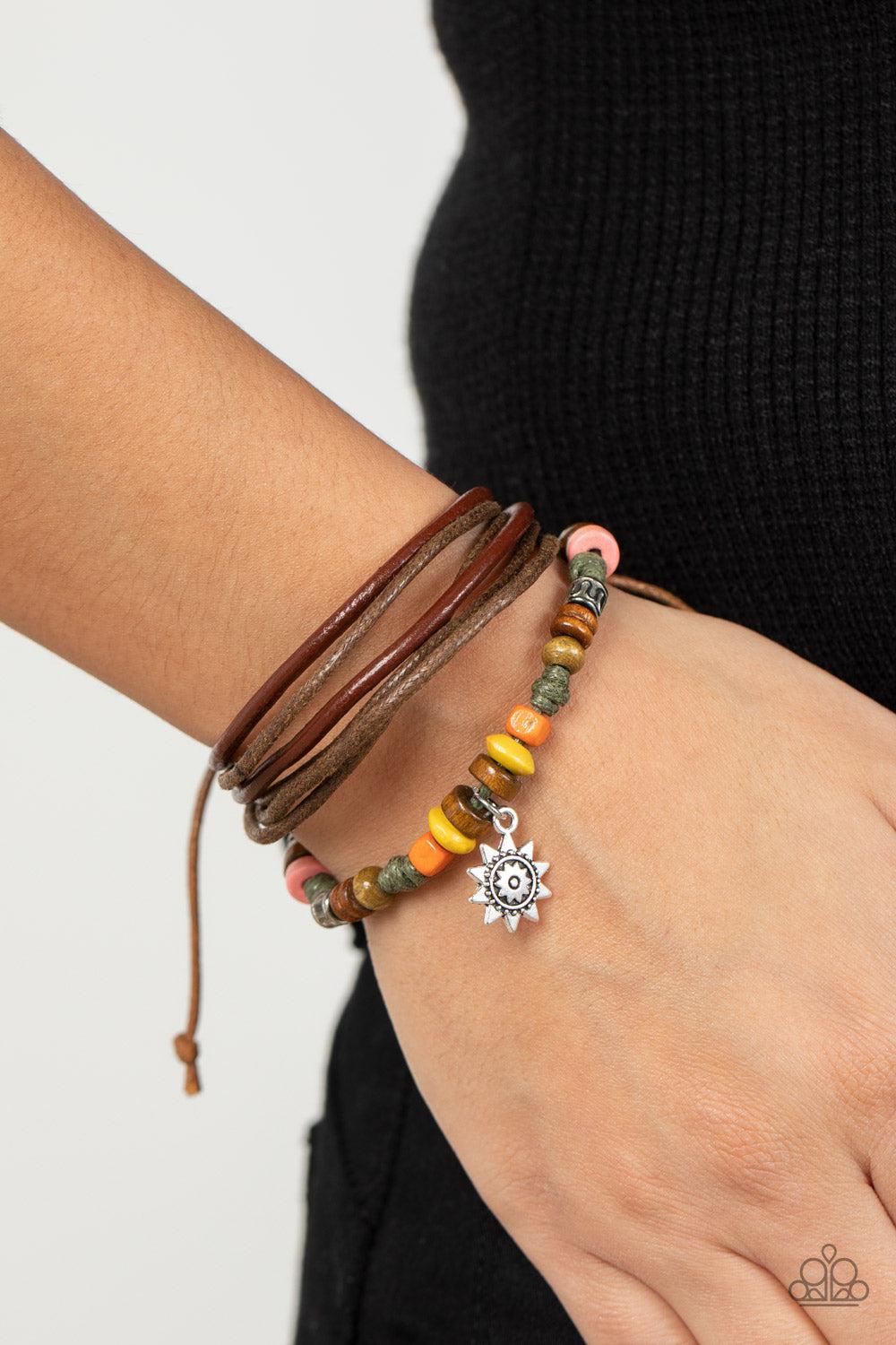 Wild SOL Multi Sun Charm Urban Bracelet - Paparazzi Accessories- on model - CarasShop.com - Paparazzi Jewelry by Cara Jewels