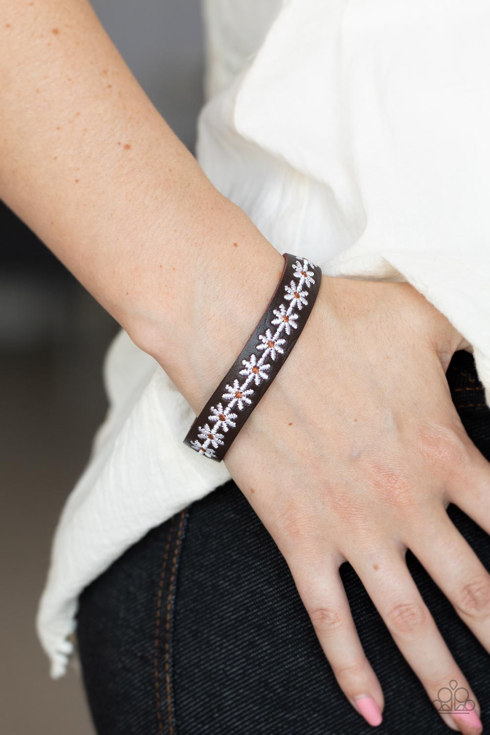 Wildflower Wayfarer White Daisy and Brown Leather Urban Wrap Snap Bracelet - Paparazzi Accessories- on model - CarasShop.com - Paparazzi Jewelry by Cara Jewels