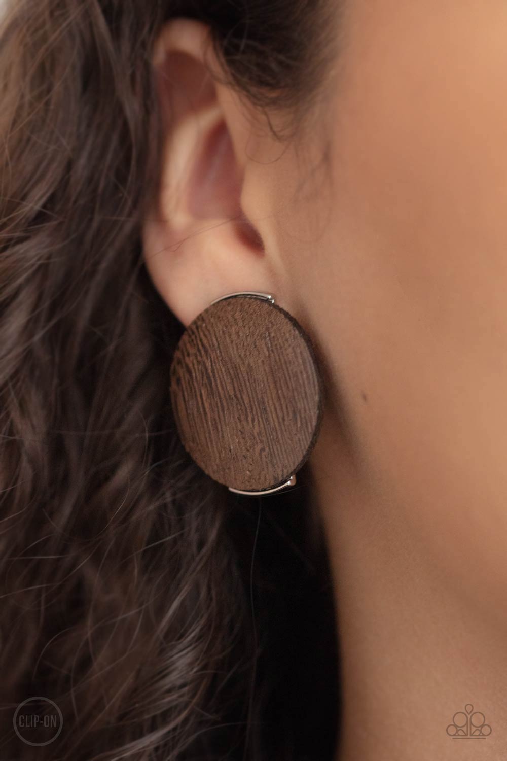 WOODWORK It Brown Wood Clip-on Earrings - Paparazzi Accessories- on model - CarasShop.com - Paparazzi Jewelry by Cara Jewels