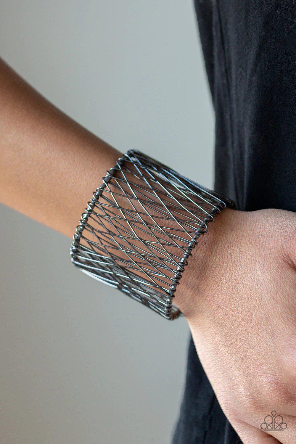 Work for Wire Black Cuff Bracelet - Paparazzi Accessories- on model - CarasShop.com - Paparazzi Jewelry by Cara Jewels