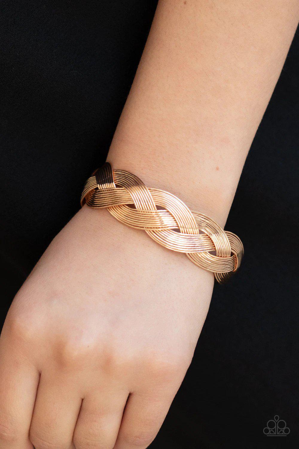 Woven Wonder Gold Bracelet - Paparazzi Accessories- on model - CarasShop.com - Paparazzi Jewelry by Cara Jewels