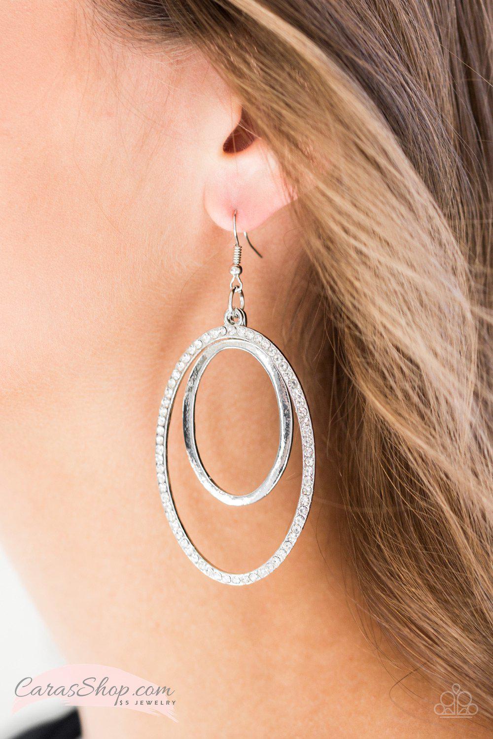 Wrapped In Wealth - Silver and White Rhinestone Earrings - Paparazzi Accessories- lightbox - CarasShop.com - Paparazzi Jewelry by Cara Jewels