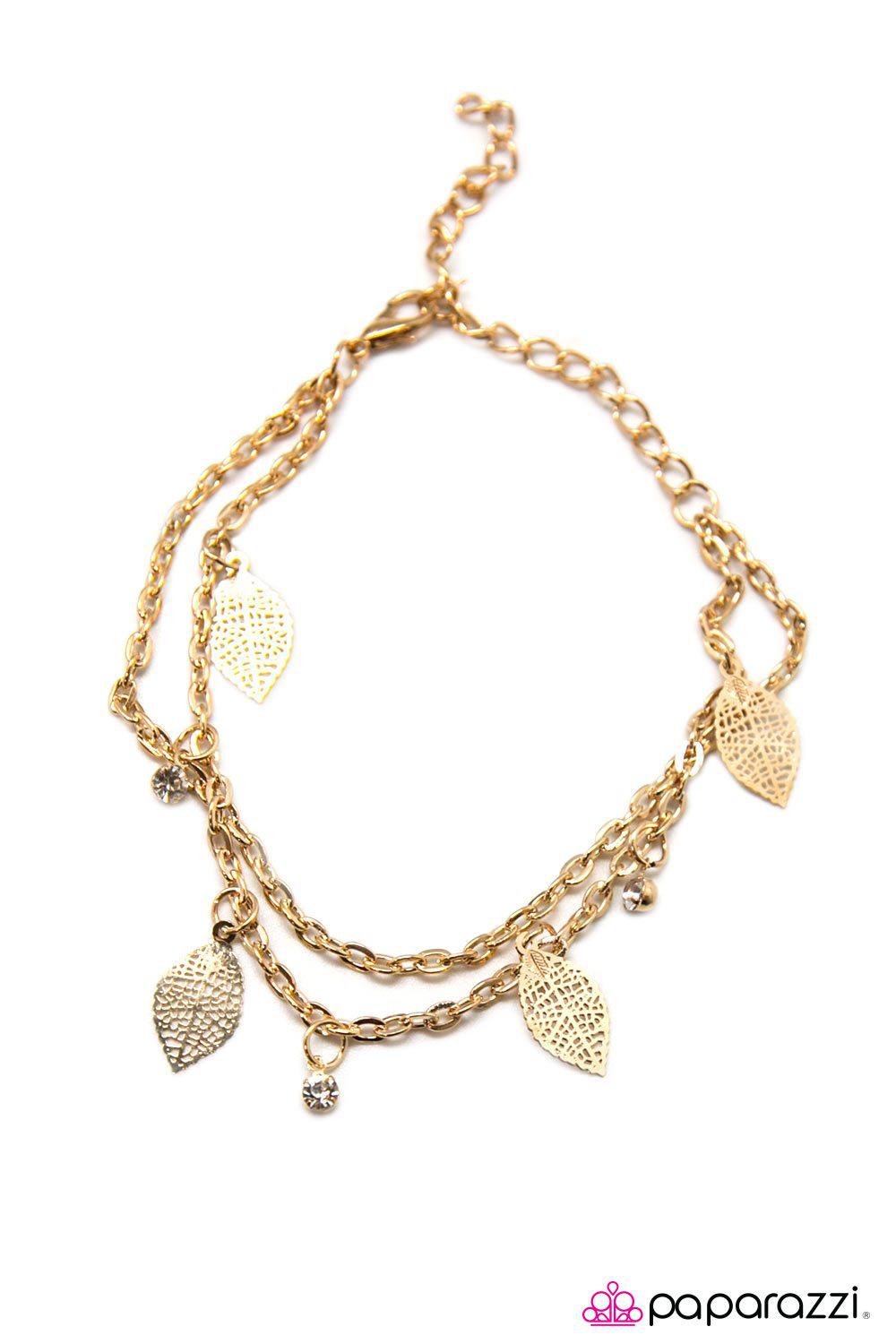 You Better BeLEAF It Gold Bracelet - Paparazzi Accessories- on model - CarasShop.com - Paparazzi Jewelry by Cara Jewels
